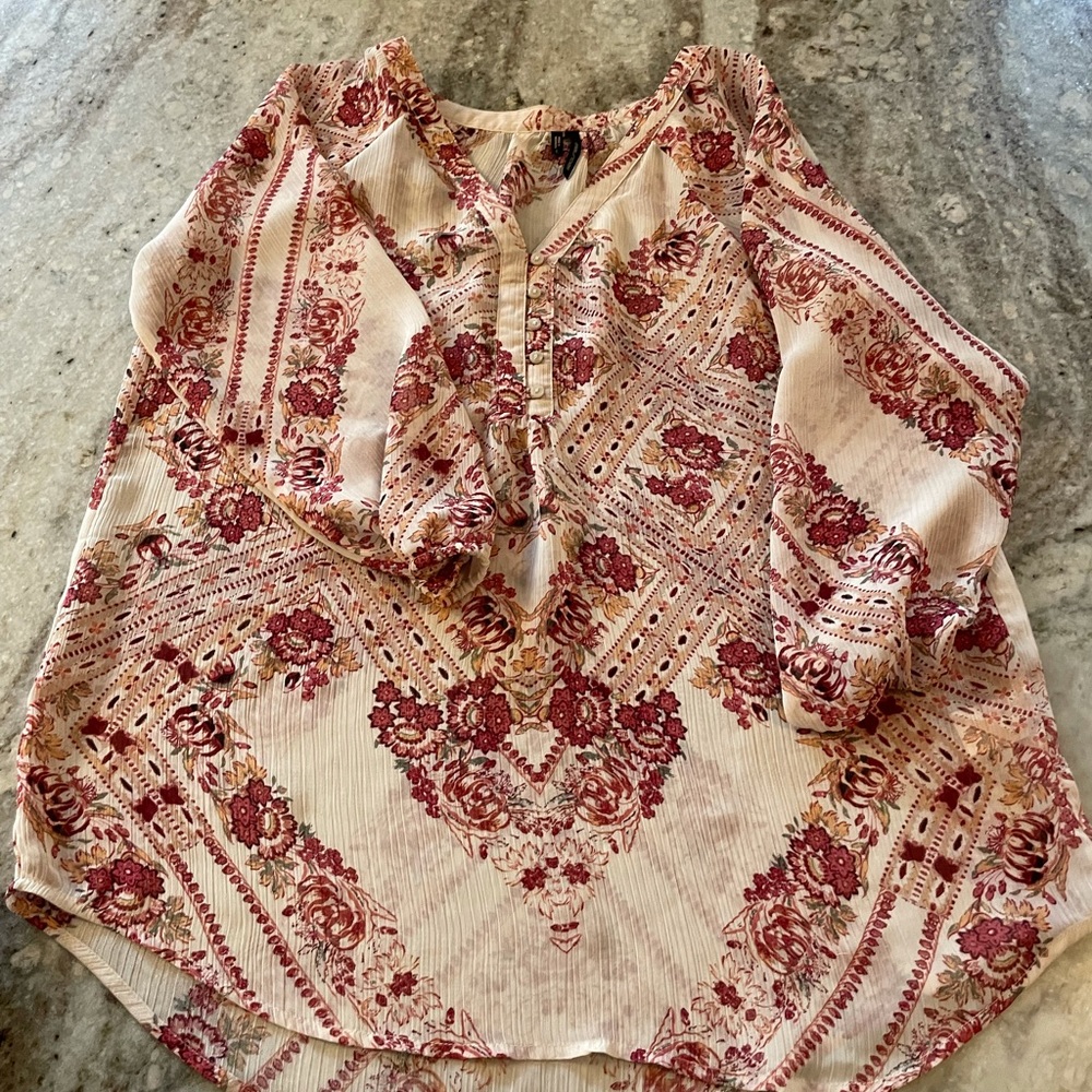 Lightweight, sheer, beautiful top.